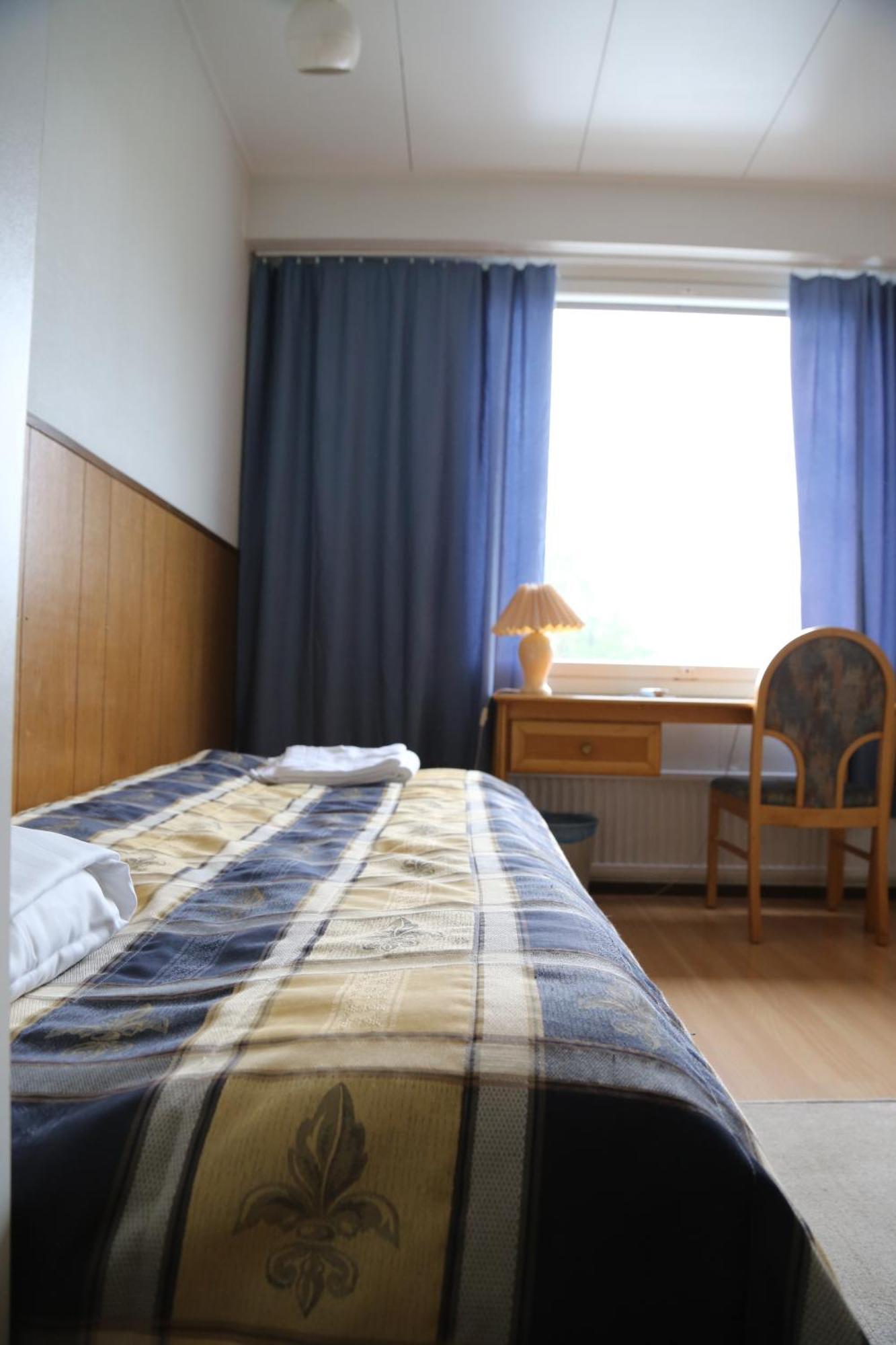 Hotelli Iisalmen Seurahuone Idensalmi Rom bilde